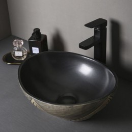 Lavabo de cerámica negra...